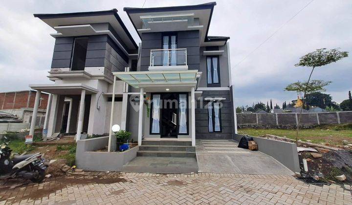 Rumah villa jual, baru, pool, udara sejuk, di jalan arteri batu 1