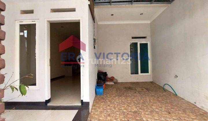 Rumah jual kondisi istimewa dekat UB hwa ind tenang aman 2