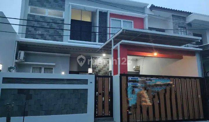 Rumah Minimalis 2 1/4 Lantai di Taman Semanan Indah, JakBar 1