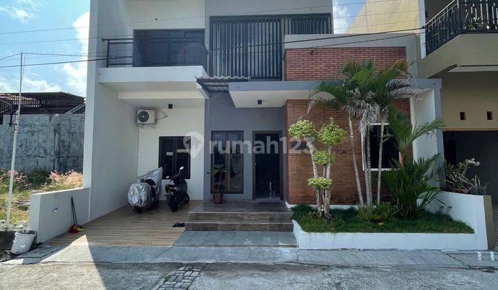 Rumah cluster fully furnished desain retro industrial modern dekat Solo Baru 1