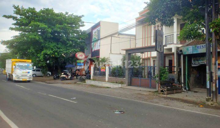 Rumah bagus 2 lantai
pinggir jalan raya 21