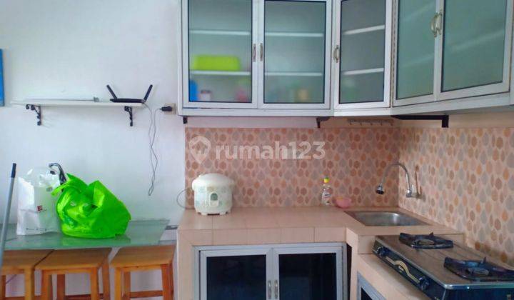 Rumah cantik 1,5 lantai siap huni dengan perabotan di cluster 21