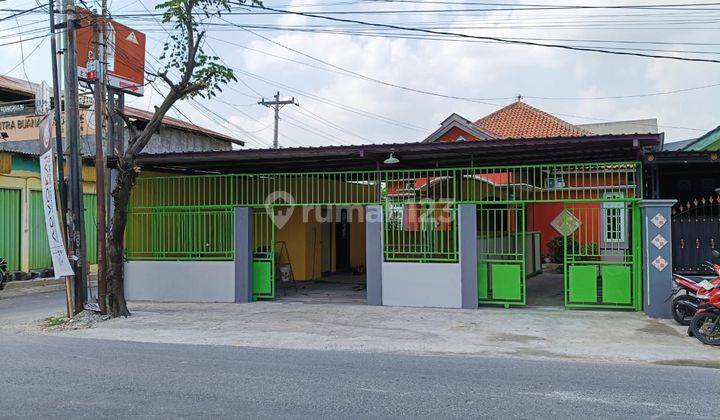 Rumah + Ruang Usaha Pinggir Jalan Strategis 1