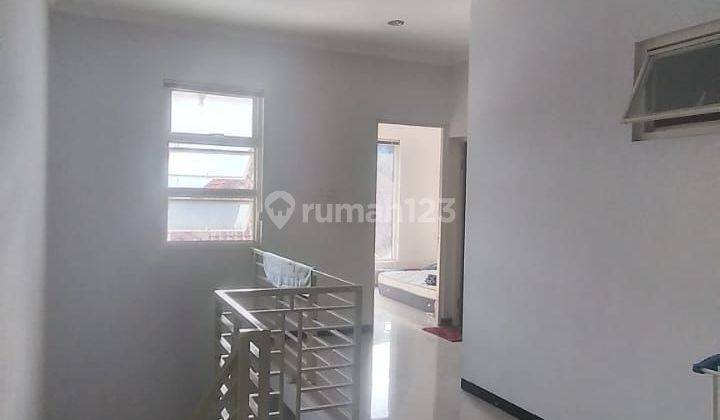 Rumah Siap Pakai 
2 Lantai Tengah Kota
desain Modern Minimalis 2