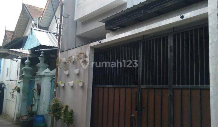 Rumah Siap Pakai 
2 Lantai Tengah Kota
desain Modern Minimalis 1