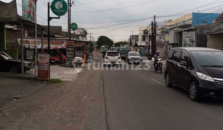 Warehouse and Residence Combined on the Side of the Main Highway