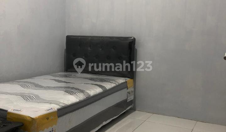 1.5-Story House in Mulyosari Baru Area, Surabaya 1.5-Story House in Mulyosari Baru Area, Surabaya