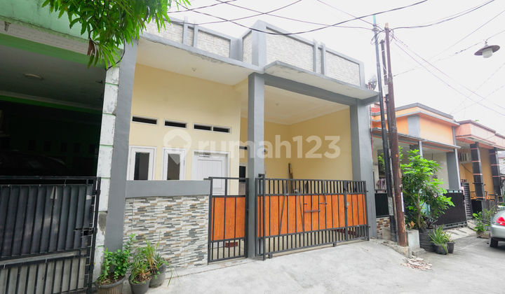 Rumah 10 menit ke Plaza Taman Harapan Baru SHM Dibantu KPR J-31972 2