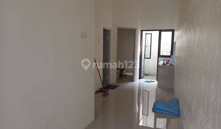 Rumah 7 Menit ke Gerbang Tol Sawangan 4 SHM Hadap Timur J34036 2