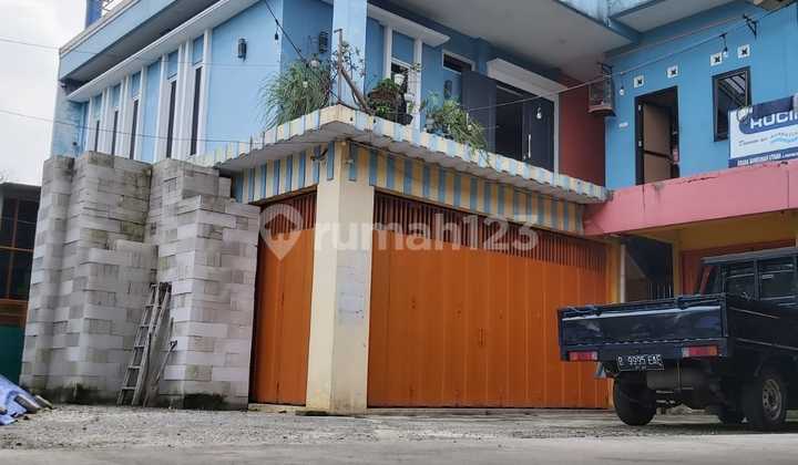 land / commercial space ex. building materials 2-story house low price in Cibinong