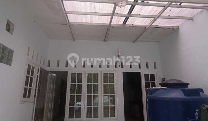 tampak depan rumah dijual taman laguna cibubur