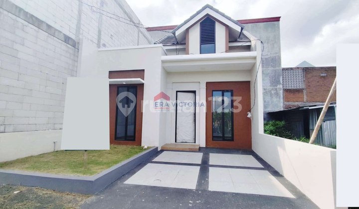 Looking for Your Dream Home? This House is the Answer! A Minimalist Residence with Modern Design and an Exclusive Environment. Move-in Ready, Ready for Happiness! Featuring a Modern Green Ambiance in Malang City. 2