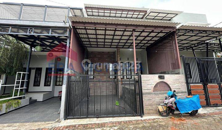 Dijual Rumah Semi Furnished Dengan Konsep Jepang Dearah Sumbersekar Dau Kondisi Sangat Istimewa, Minim Renovasi, Lokasi Nyaman, Keamanan 24 Jam  1