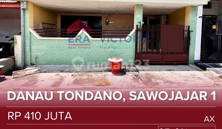 Rumah Jual Lokasi Depan Lapangan Parkir Bersama Akses Jalan Mobil Suasana Nyaman, Kawasan Padat Penduduk. 2 Kamar Jadi 1 Kamar Besar