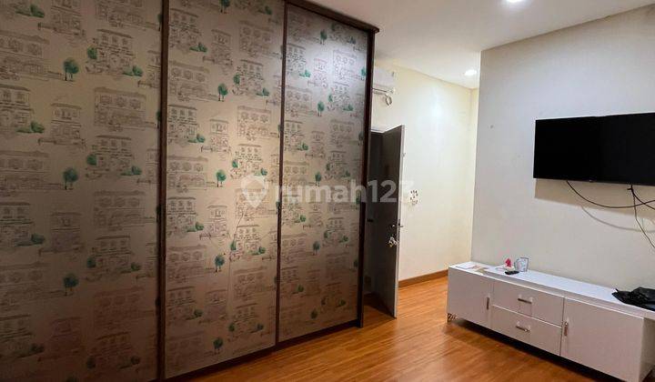 Rumah disewakan green lake city 6x15 semifurnished  1