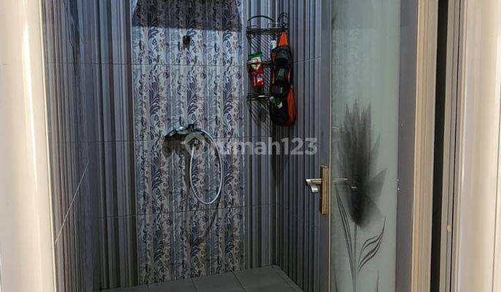 Rumah Luas Nyaman Dan Asri di Graha Raya Bintaro 2