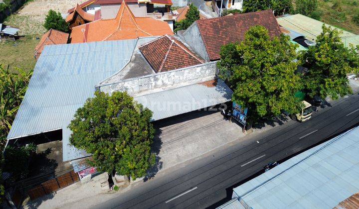 Land for Sale Containing Buildings on the Side of the Banyuning Road 1