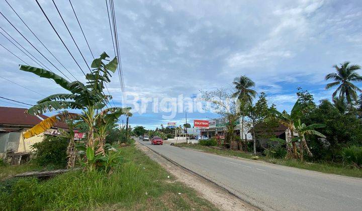 TANAH DAN 3 UNIT BANGUNAN RUMAH DIPINGGIR JALAN RAYA 1