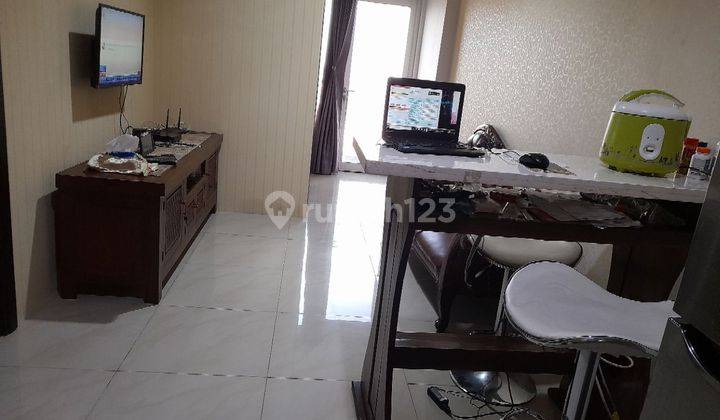 Apartemen aspen semi furnished disamping one bell park 1