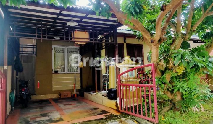 RUMAH MINIMALIS SIAP HUNI DALAM CLUSTER PERUMAHAN ELIT
