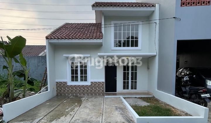 RUMAH DEPOK SIAP HUNI TYPE MEZANINE DI DALAM CLUSTER 
