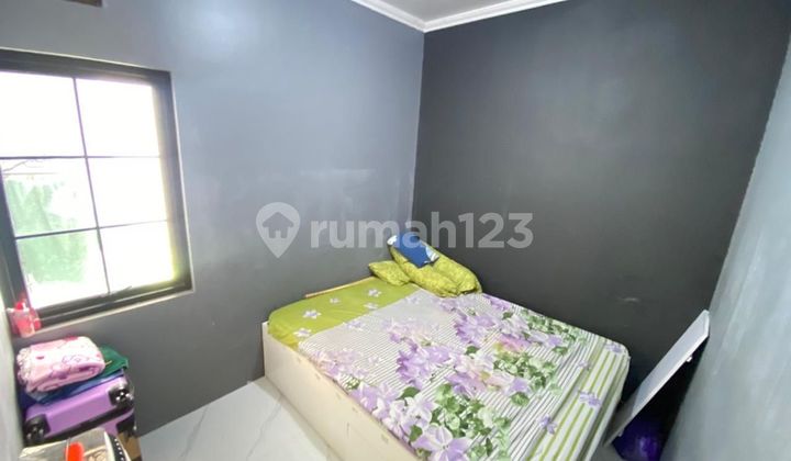 Well-Maintained 2-Bedroom House, 4 Minutes to Mitra Keluarga Hospital Pamulang, Ready to Occupy J39313 2