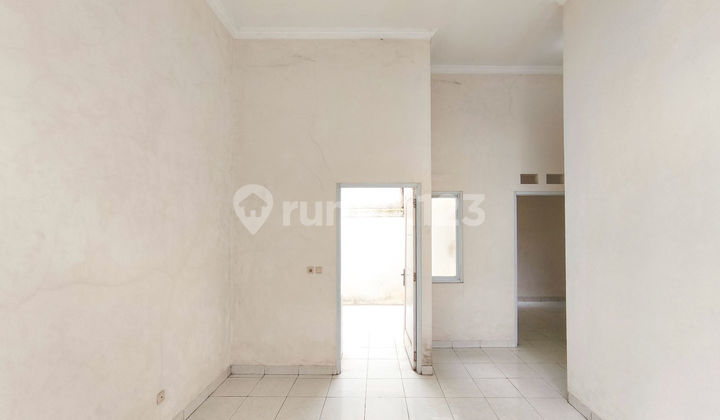 Rumah Bebas Banjir 14 Menit ke Citiplaza Kutabumi Hadap Timur J42009 2