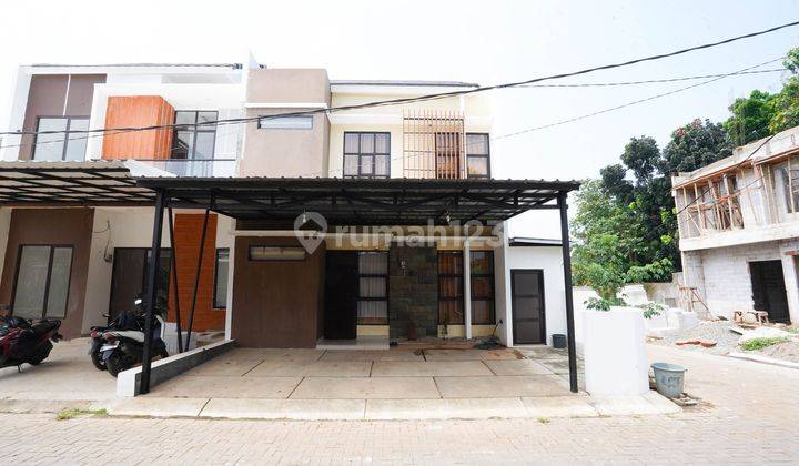 Rumah 8 Menit ke Pamulang Square Carport Luas 2 Lt Dibantu KPR J24358 1