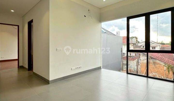 Rumah mewah murah dalam townhouse pinggir jalan raya utama  6