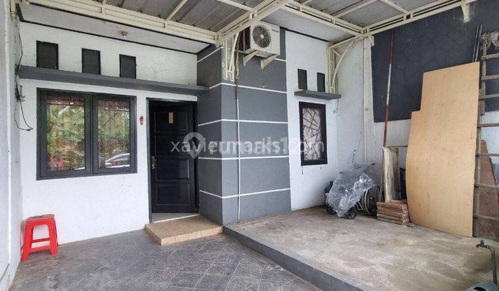 tampak depan rumah di grand sutera kutabumi