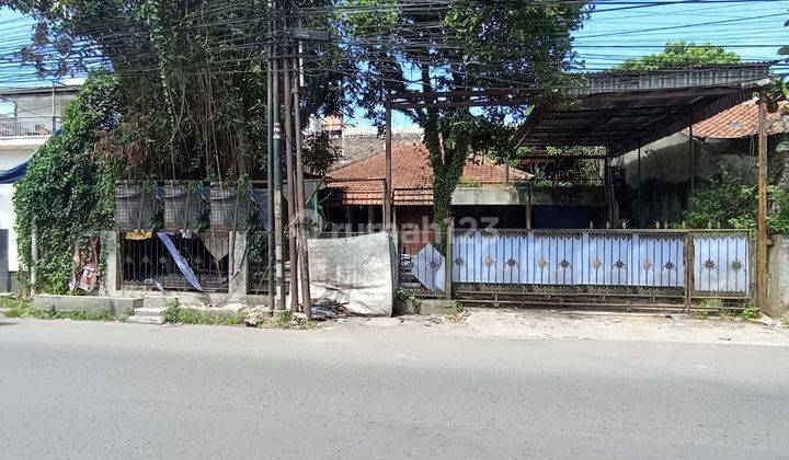 Tanah + Rumah Strategis Pinggir Jalan di Caringin 1