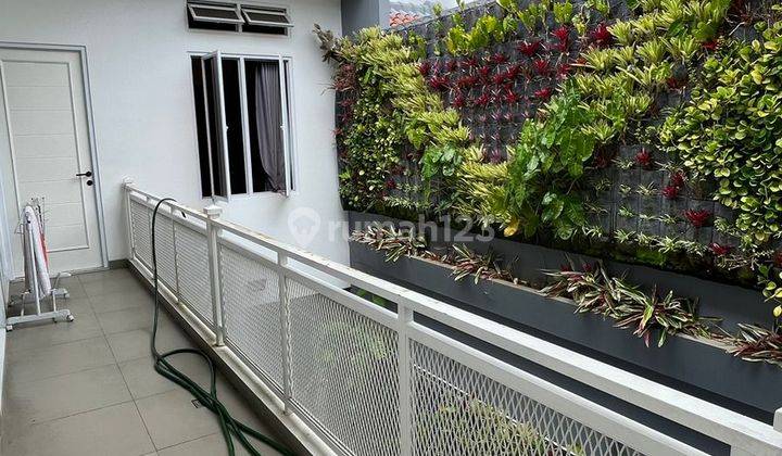 Rumah Arcamanik Minimalis Modern Dengan Kolam Renang 11