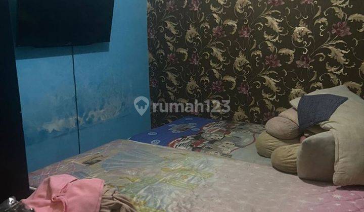 Rumah Strategis 10 menit ke Plaza Taman Harapan Baru Hadap Selatan Dibantu KPR J25590 2