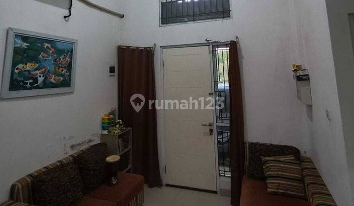 Rumah Hadap Utara 13 menit ke Plaza Taman Harapan Baru Dibantu KPR J22157 2
