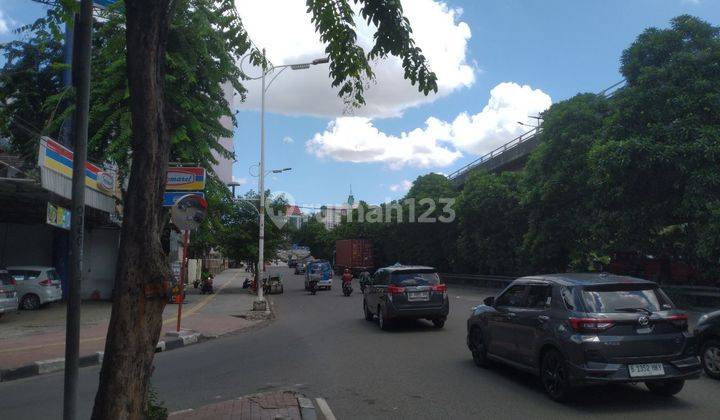 Lahan dengan rumah tua pinggir jalan raya grogol  2