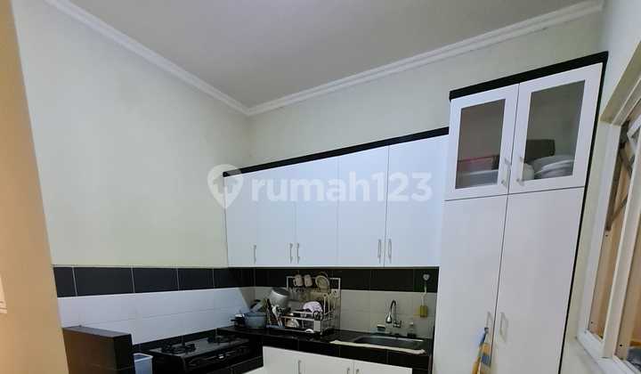 Rumah Cluster One Gate System Siap Huni Lingkungan Nyaman di Perum Graha Padma 1