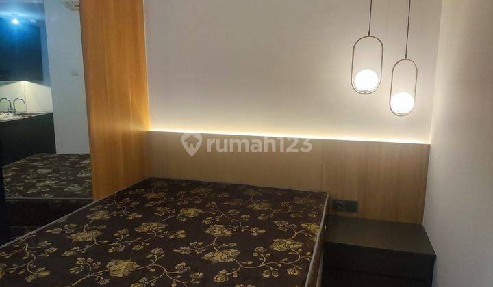 Disewakan Landmark Residence studio furnished bagus 2