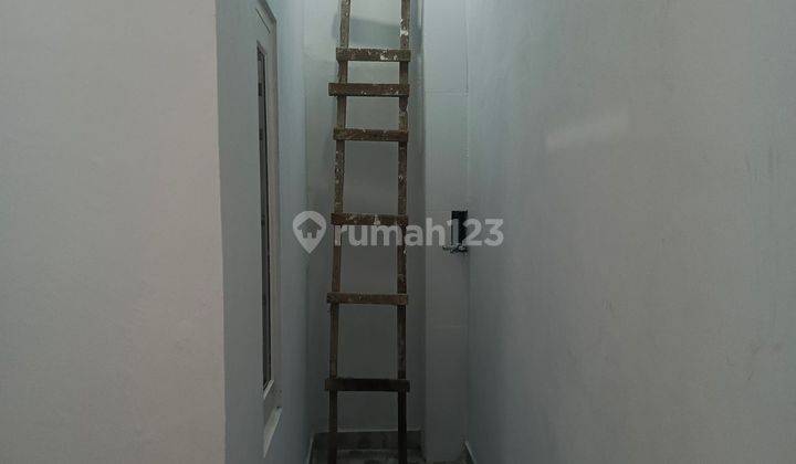 Rumah DP Murah 10 menit ke Plaza Taman Harapan Baru Dibantu KPR J31173 2