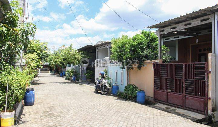 Rumah Bebas Banjir 15 menit ke Plaza Taman Harapan Baru Dibantu KPR J17540 2