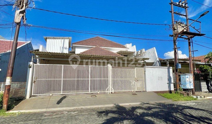 A 2-story house in Manyar Tirtomoyo with a Solahart water heater. 2