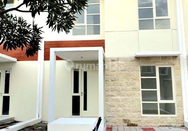 Rumah Valencia Strait Puri Surya Jaya 2 Lt Taman Luas 1