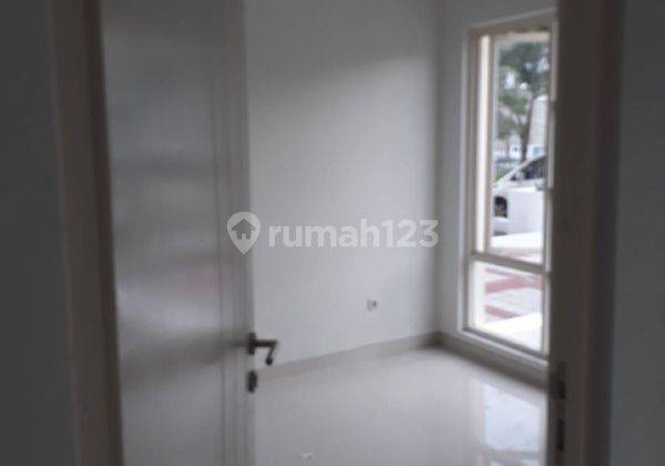 Rumah Valencia Strait Puri Surya Jaya 2 Lt Taman Luas 6
