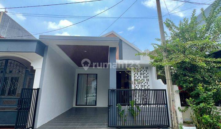 Rumah Modern Compact Pakuwon City Cluster Griya Asri Furnished 1
