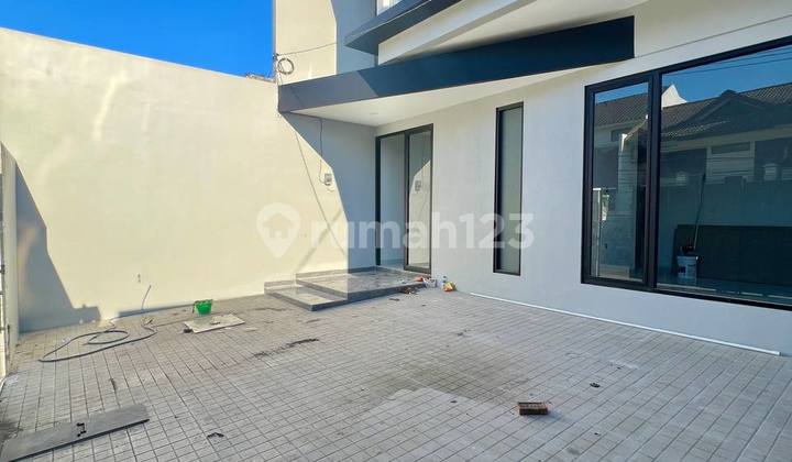 Contemporary New House in Manyar Jaya 2 Floors with Back Garden 2