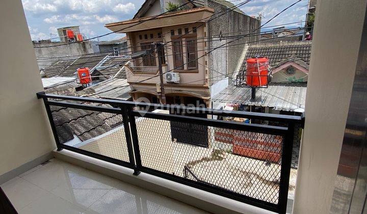 RUMAH BARU 2 LANTAI SIAP HUNI KOMPLEK TAMAN CIBADUYUT INDAH 2