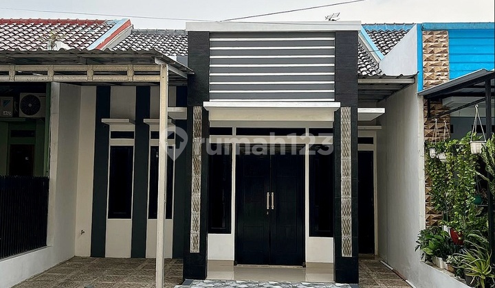 Dijual Cepat Rumah Modern Minimalis Dalam Cluster di Tanah Baru Beiji