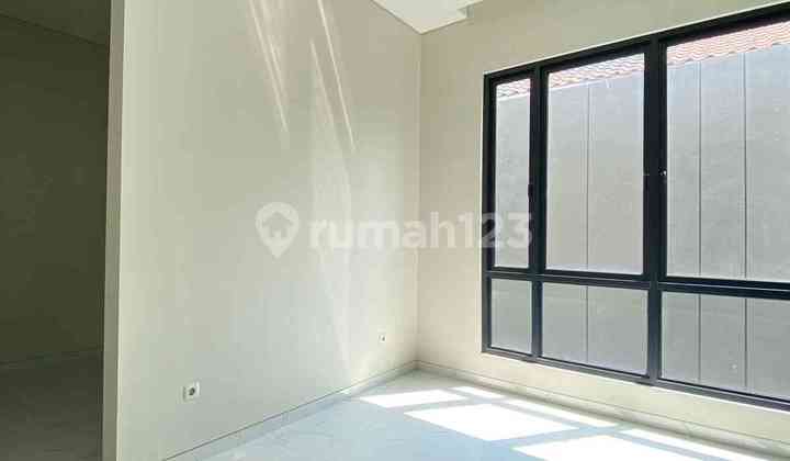 Rumah Modern Taman Puspa Raya Citraland Surabaya  2