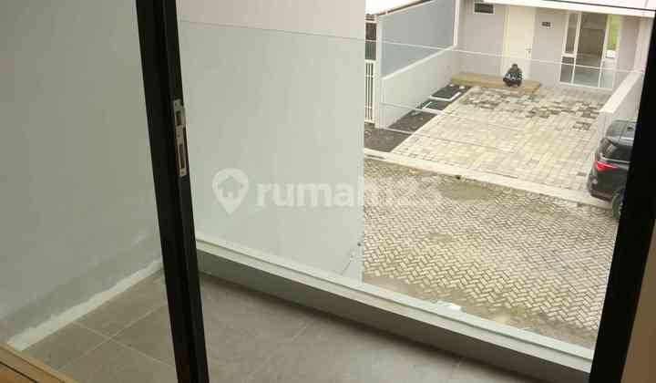 GRESS Rumah Minimalis GRAHA GREEN GARDEN 2