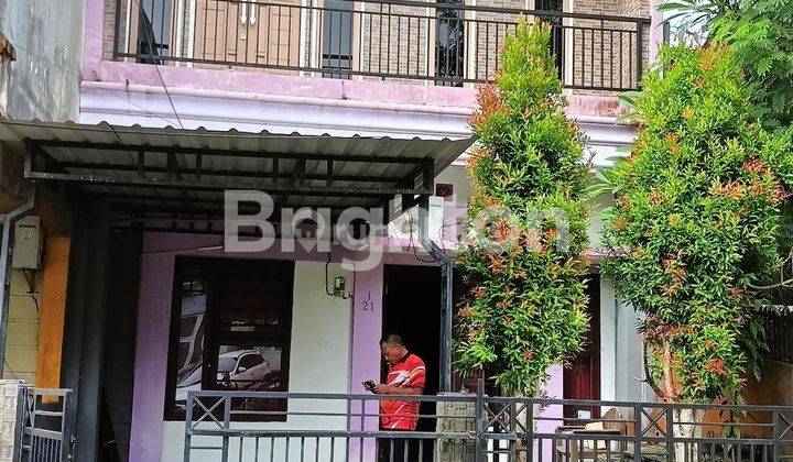 rumah tingkat 2 bernuansa  ungu dekat bandara sepinggan 1