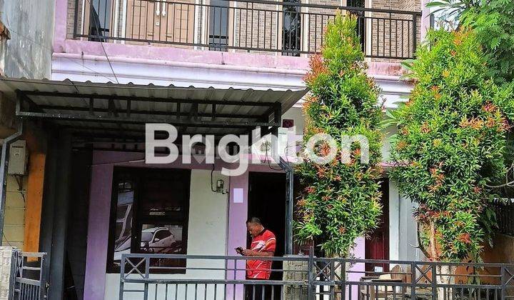 rumah tingkat 2 bernuansa  ungu dekat bandara sepinggan 1